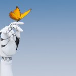 Robotic/AI hand holding a butterfly