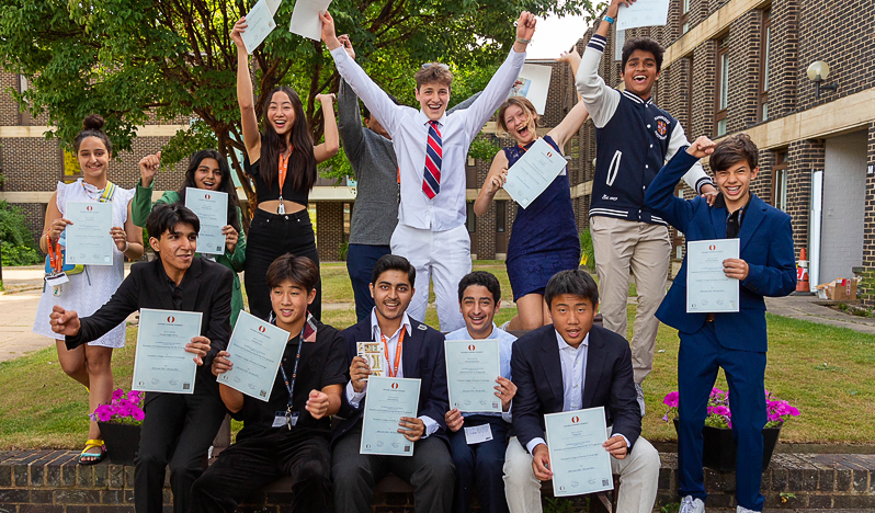 UK Summer Cours students celebrating passing with their certificates